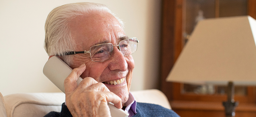 Smiling man on the phone
